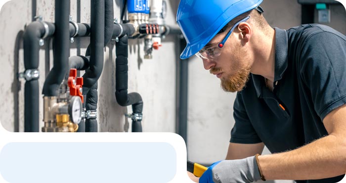 gas man fixing boiler
